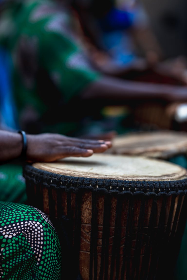 Close-up of traditional drumming in Nigeria highlighting cultural heritage.